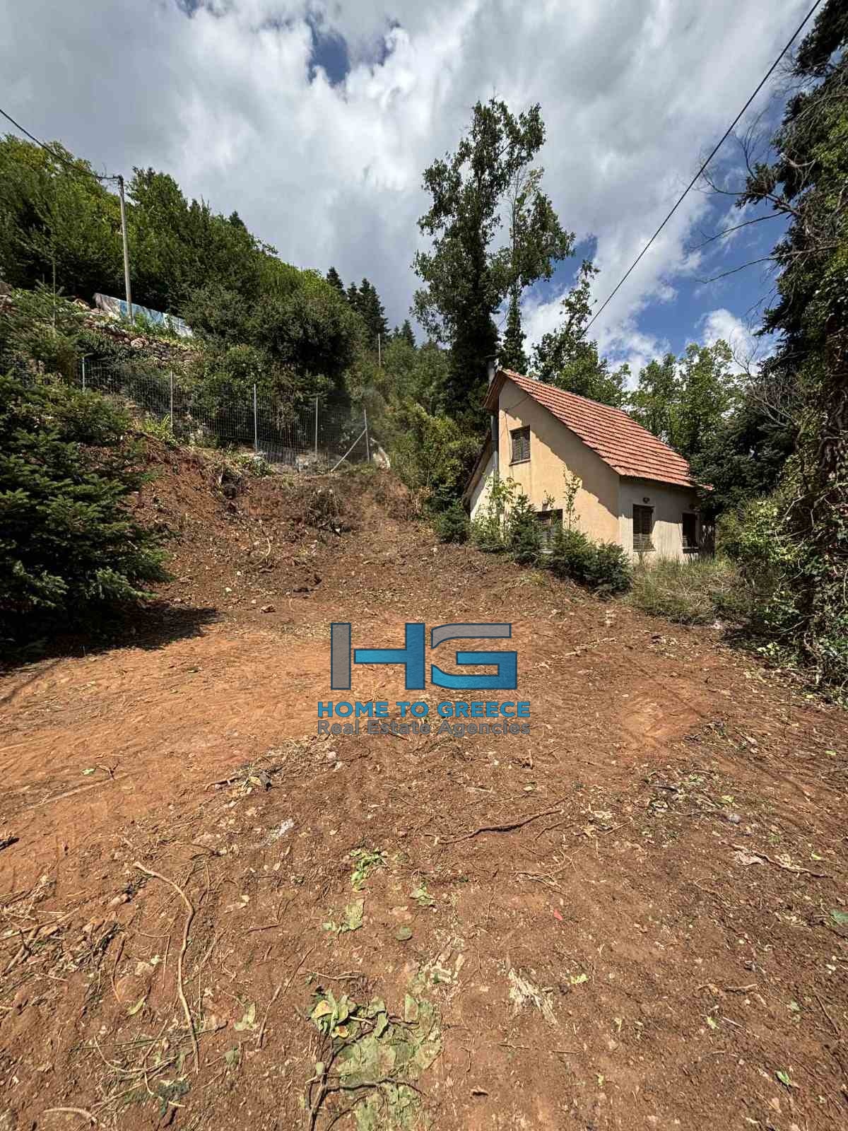 Οικόπεδο 250τμ. στα Άνω Τρίκαλα Κορινθίας – Υψηλή Δόμηση (240τ.μ.) & Θέα – 5′ από το Χιονοδρομικό